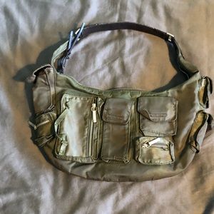 Green short strap bag with lots of pockets and large inside